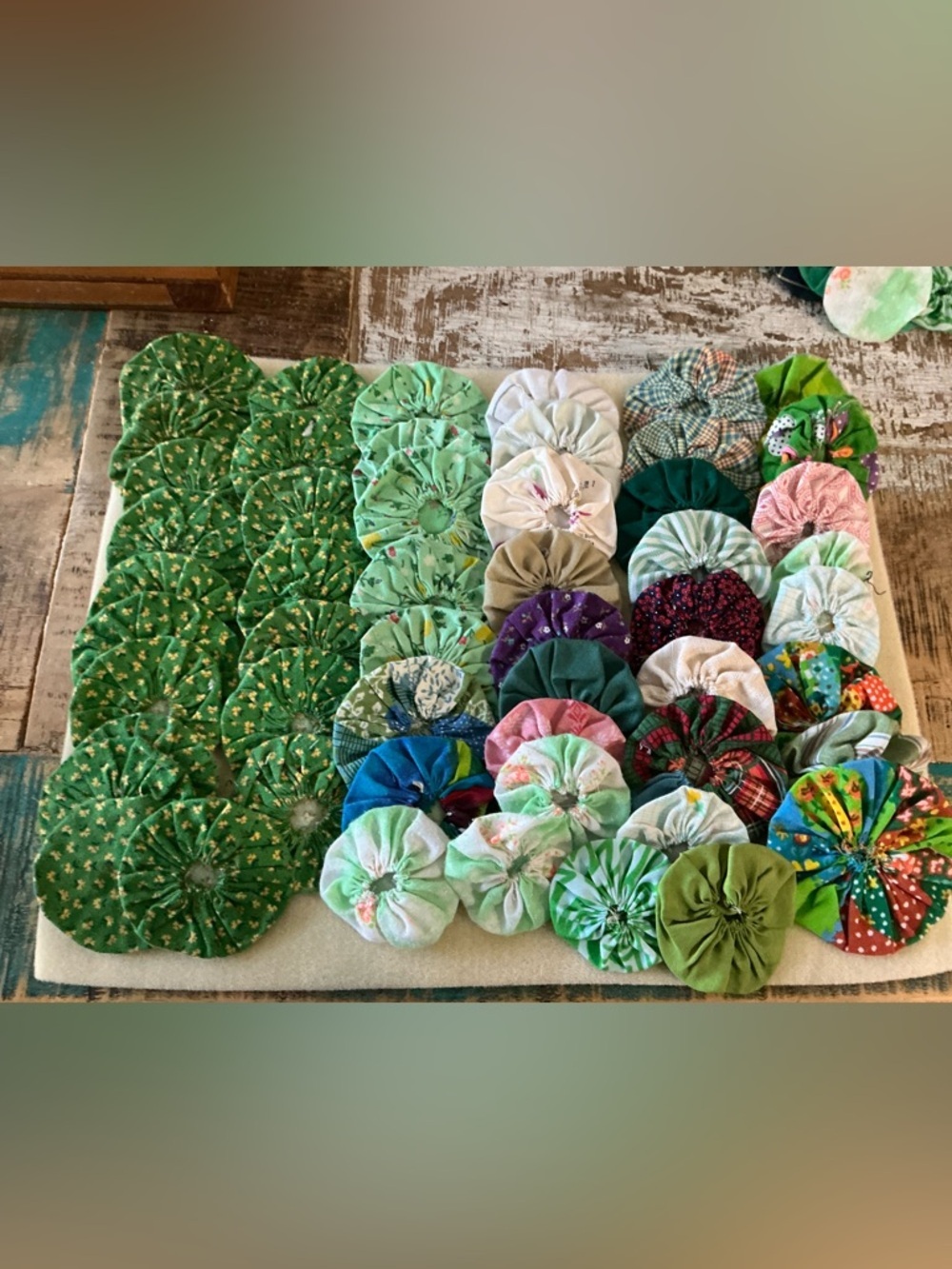 Handmade vintage Fabric Yo-Yo Quilt Pieces, total of 50!